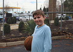 Student With Basketball